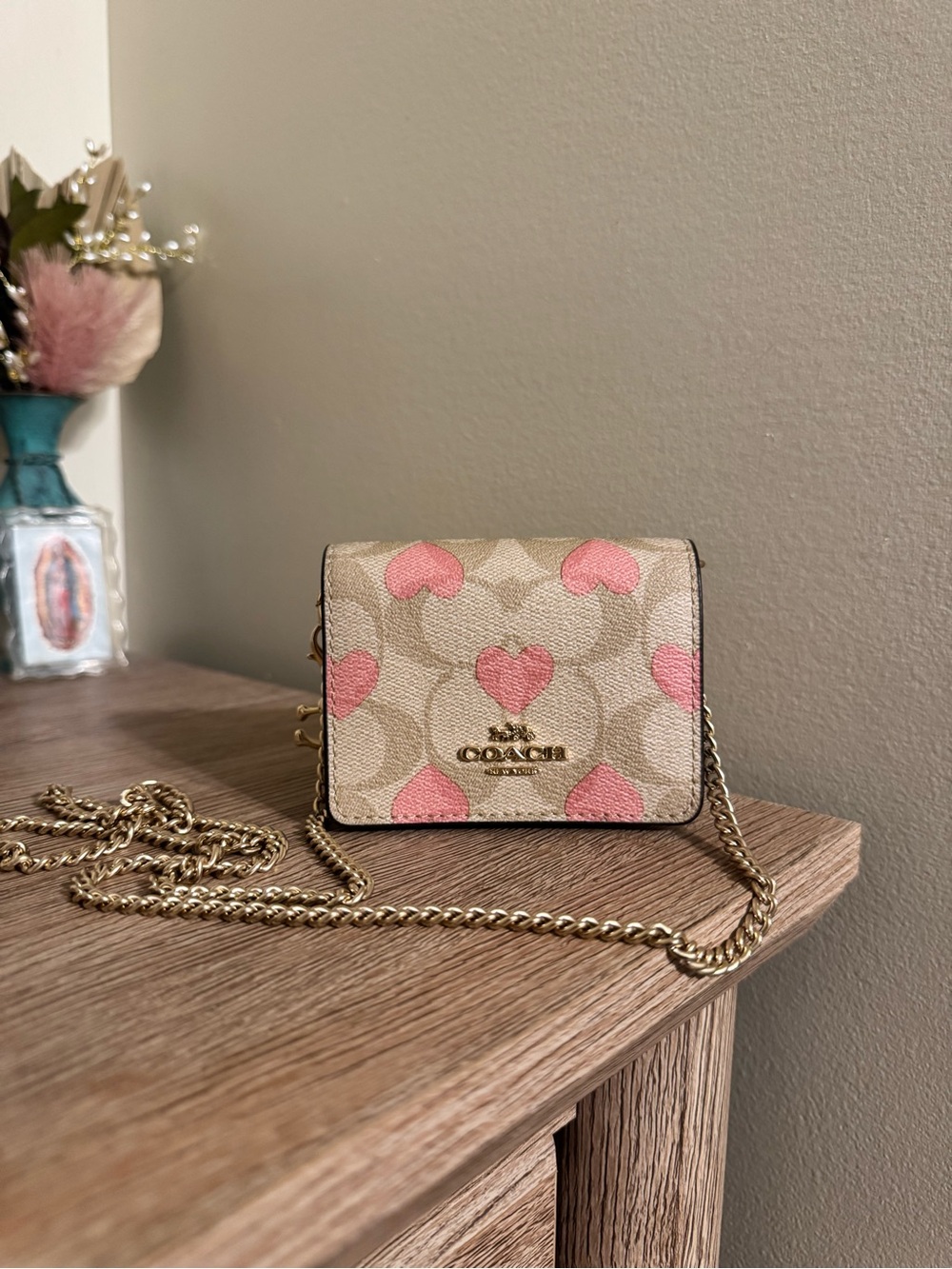COACH Tan Signature Crossbody Wallet with Pink Heart Motif